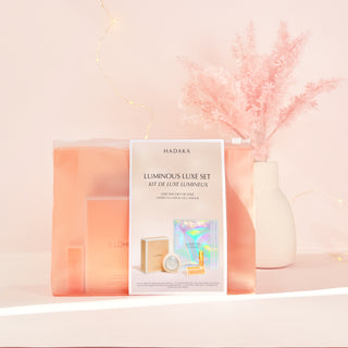 LUMINOUS LUXE SET with Led light therapy, beta-glucan face mask and hair perfume on a light pink decorative set